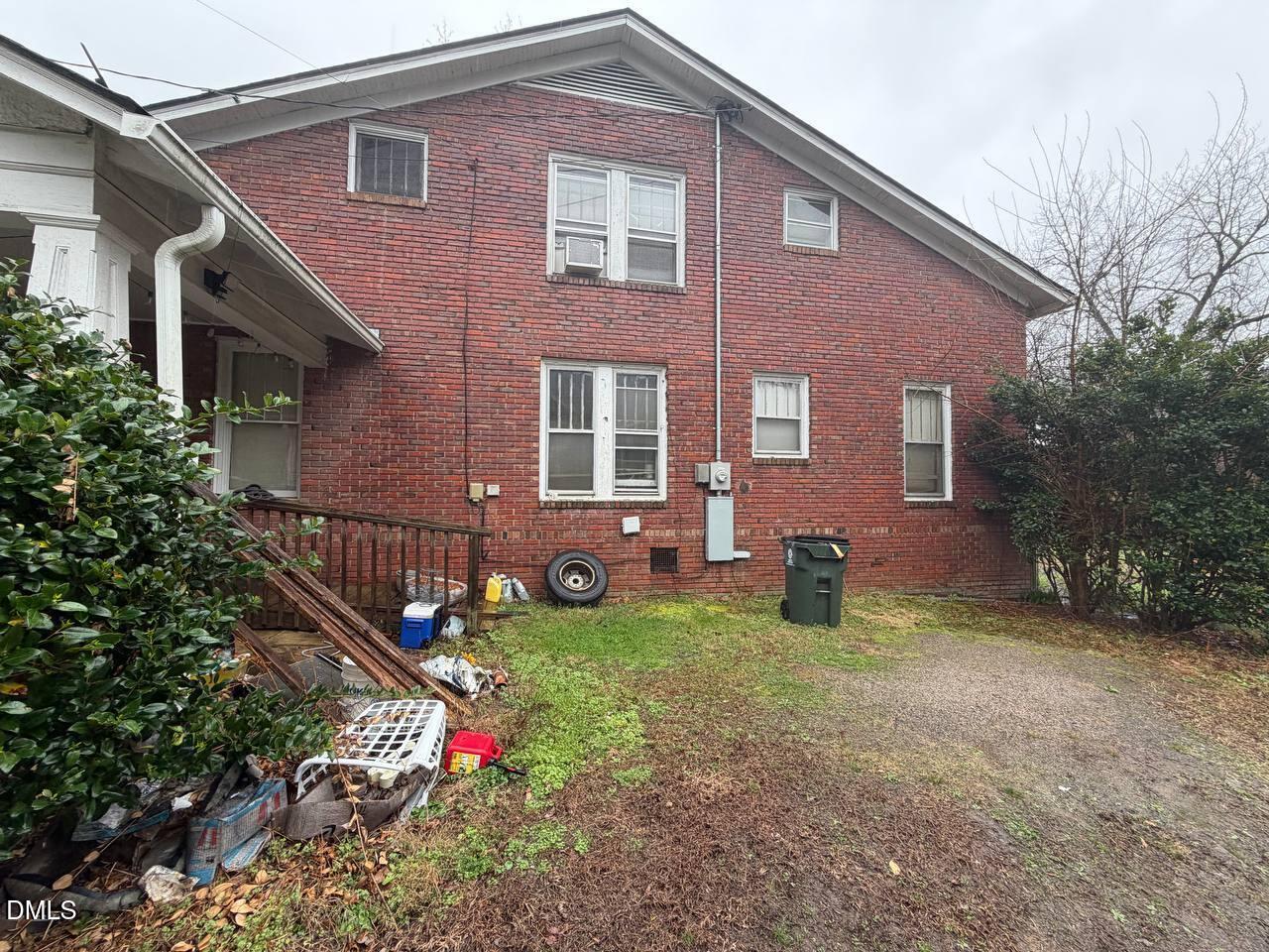 414 Raleigh Road Oxford, NC 27565 - Photo 22 of 24 a view of a house with a yard