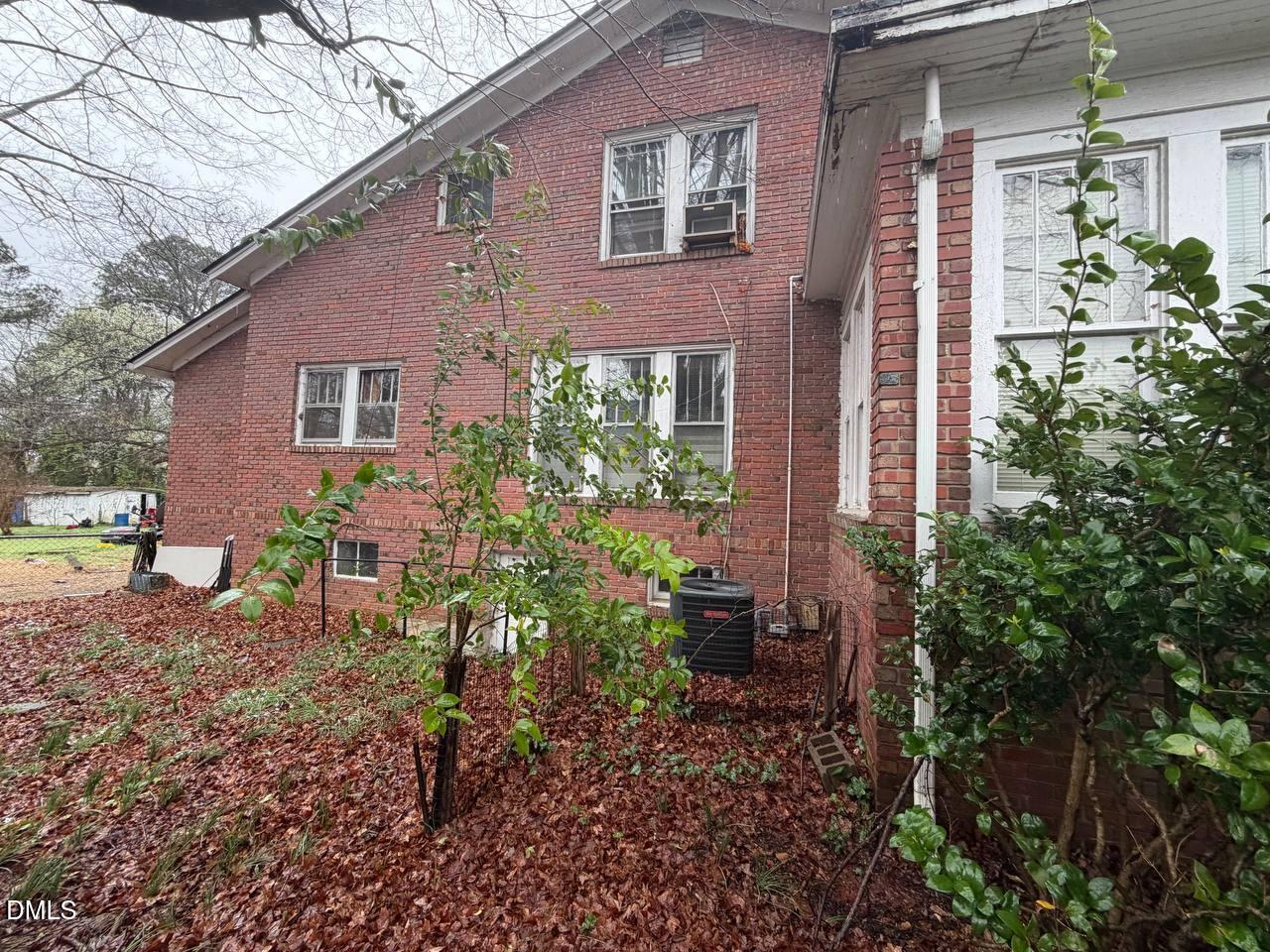 414 Raleigh Road Oxford, NC 27565 - Photo 23 of 24 a view of a house with a yard and sitting area