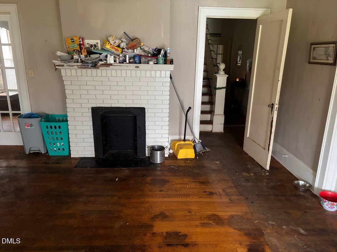414 Raleigh Road Oxford, NC 27565 - Photo 3 of 24 a view of a livingroom with furniture and a fireplace
