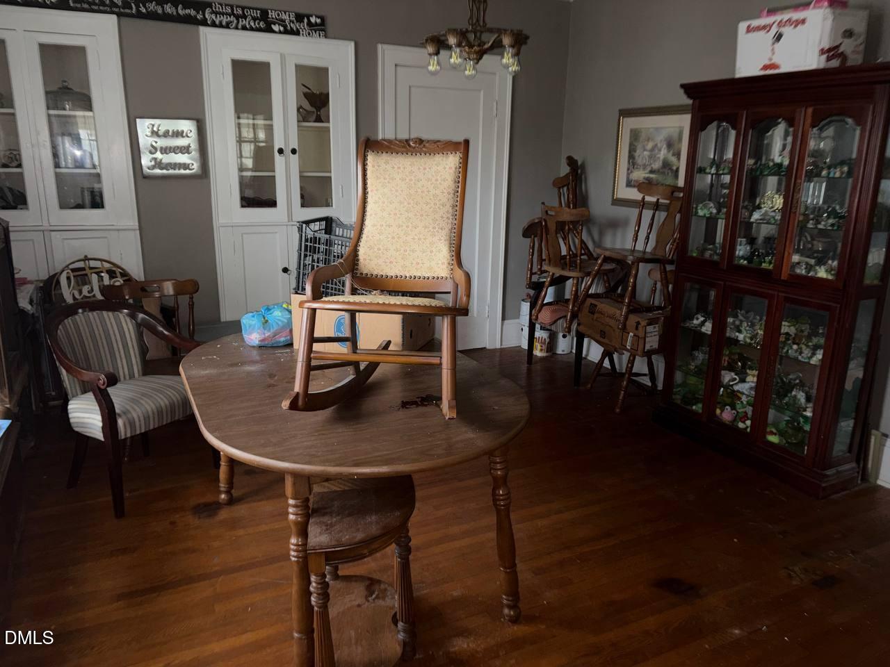 414 Raleigh Road Oxford, NC 27565 - Photo 4 of 24 a view of a dining room with furniture and window