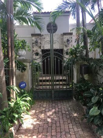 a view of a chairs and tables in the patio