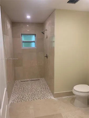 a bathroom with a toilet