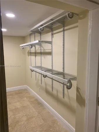 a view of a room with racks on the wall