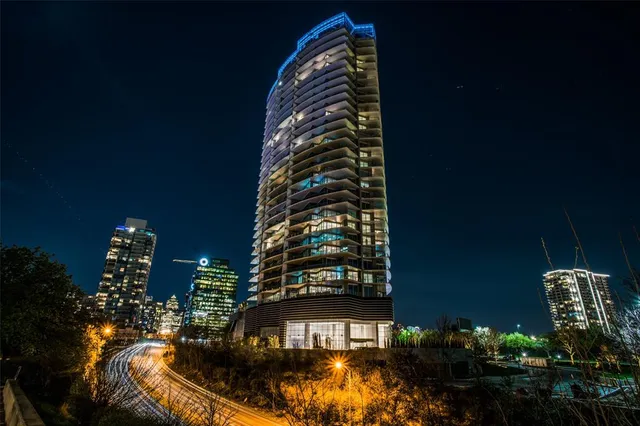 a lobby with furniture and a rug