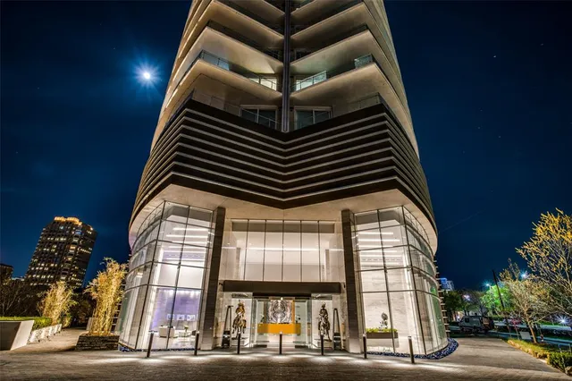 a view of a garden and swimming pool