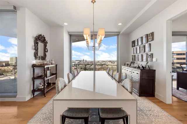a kitchen with stainless steel appliances granite countertop a refrigerator and cabinets