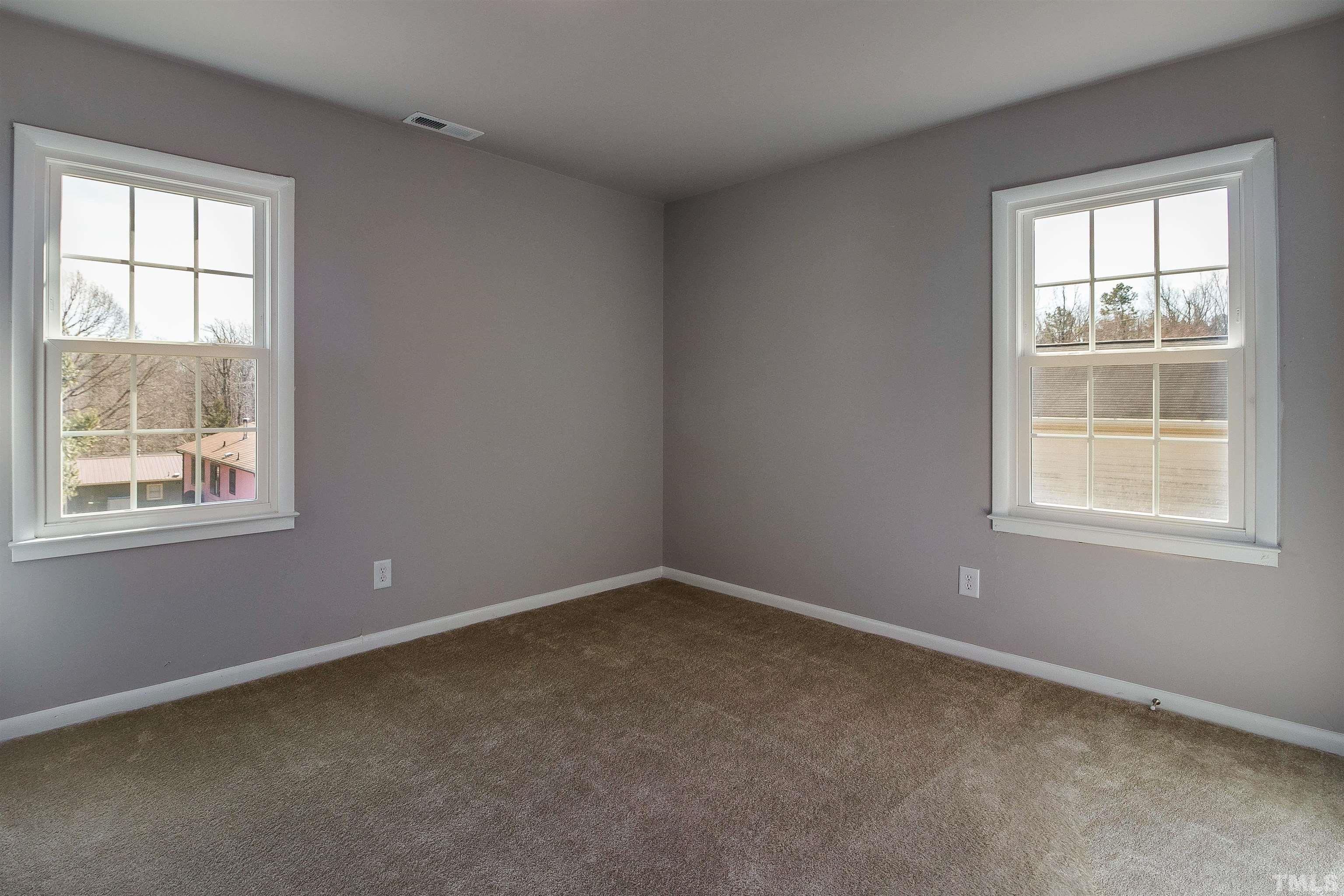 430 South Foushee Street Roxboro, NC 27573 - Photo 11 of 32 an empty room with a window
