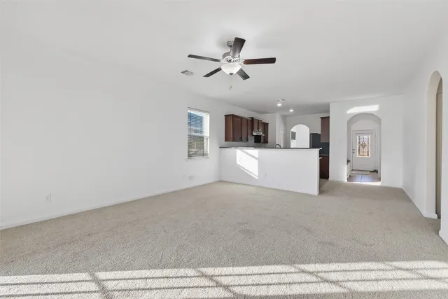 a view of a kitchen with a sink and cabinet