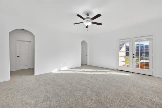 an empty room with windows