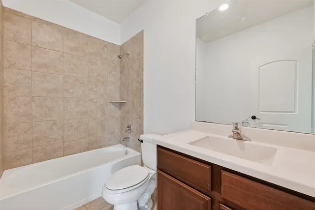 a view of a two chair under an umbrella