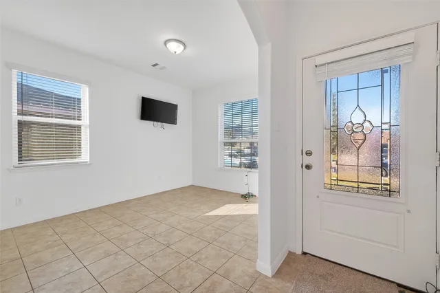 an empty room with windows