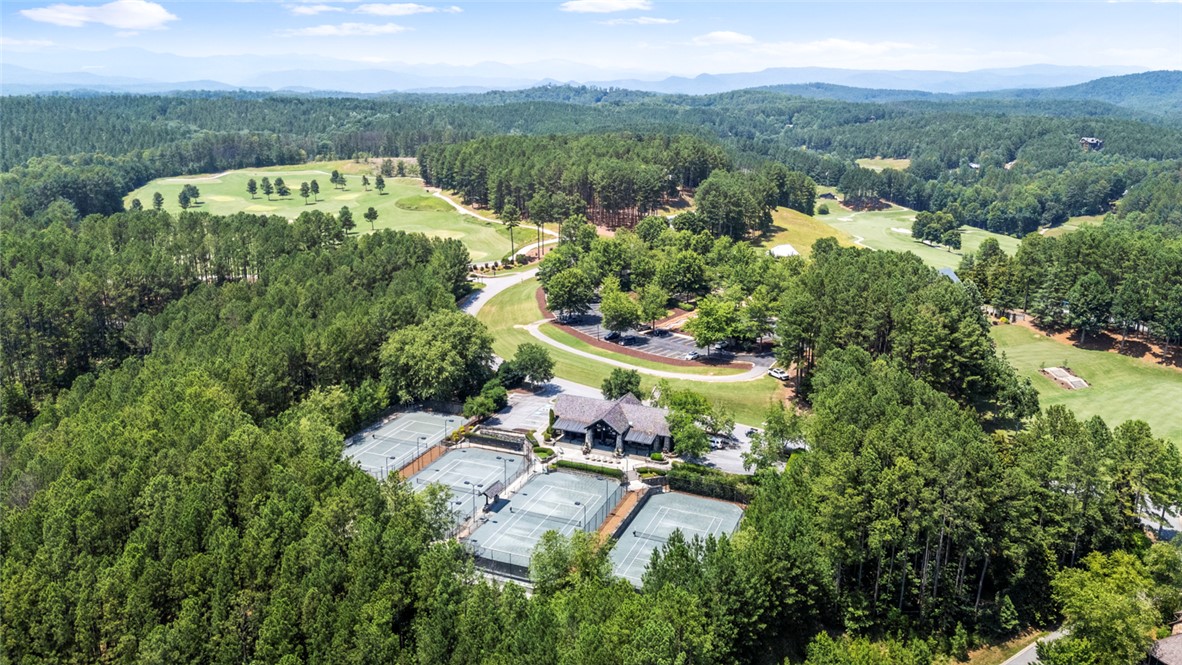 130 River Ridge Road Sunset, SC 29685 - Photo 45 of 47 An aerial perspective reveals the community's golf course and tennis facilities nestled among abundant trees.