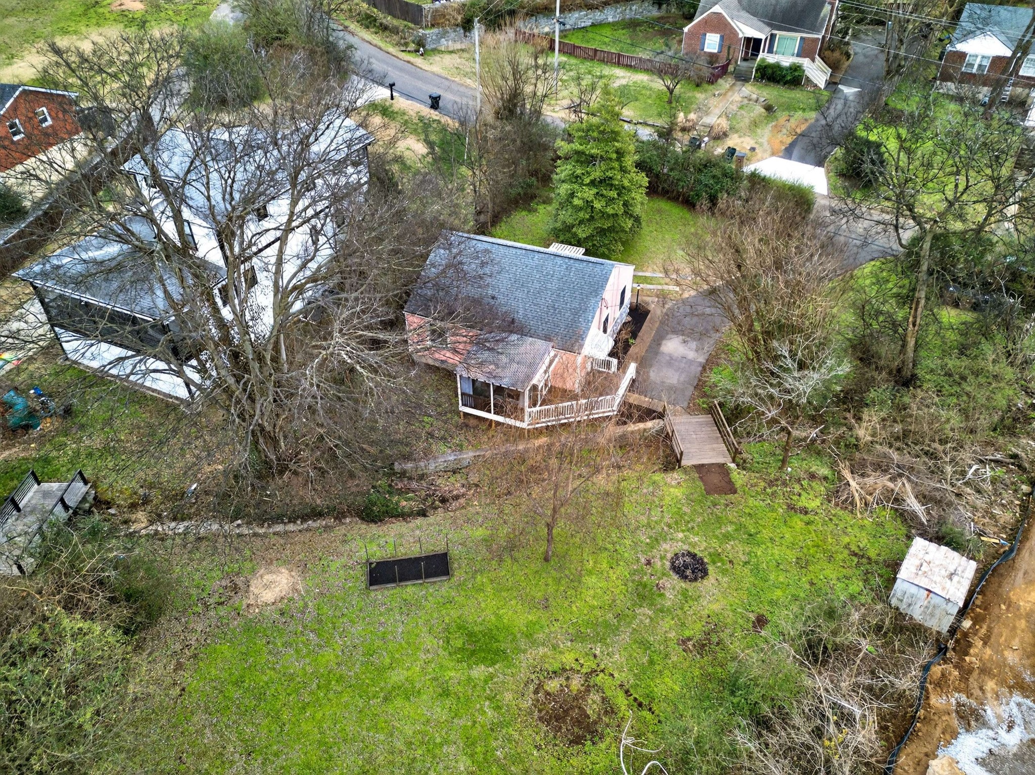 2017 Hackberry Lane Nashville, TN 37206 - Photo 32 of 36 a aerial view of a house with garden space and street view