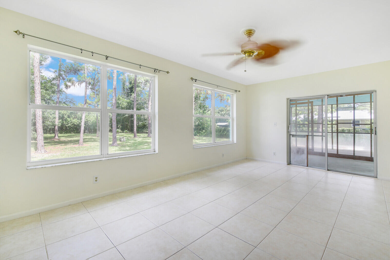 17575 Bridle Court Jupiter, FL 33478 - Photo 17 of 35 a view of an empty room with a window