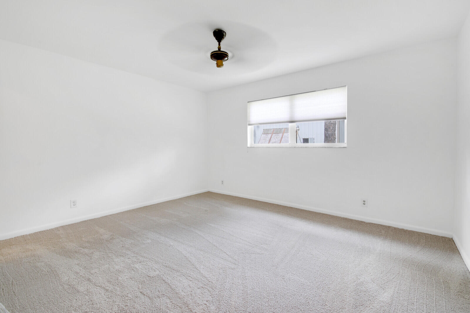 17575 Bridle Court Jupiter, FL 33478 - Photo 18 of 35 an empty room with a window