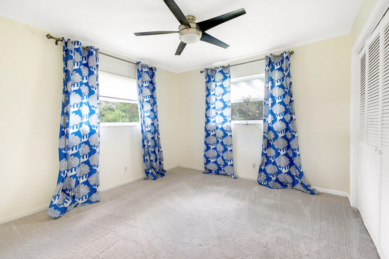 17575 Bridle Court Jupiter, FL 33478 - Photo 22 of 35 a view of a room with a garage