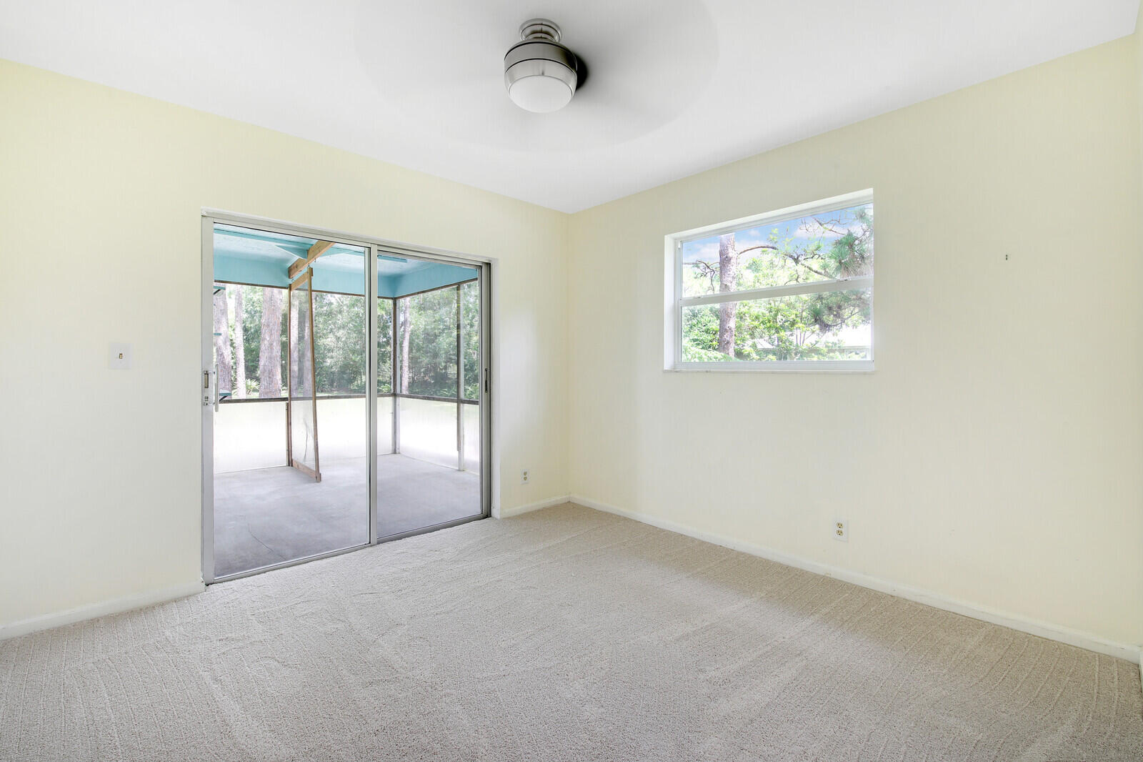 17575 Bridle Court Jupiter, FL 33478 - Photo 24 of 35 an empty room with windows
