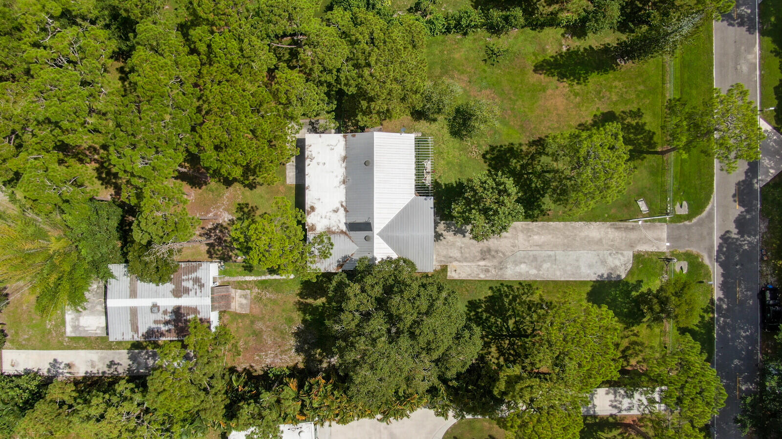 17575 Bridle Court Jupiter, FL 33478 - Photo 32 of 35 an aerial view of a house with a yard