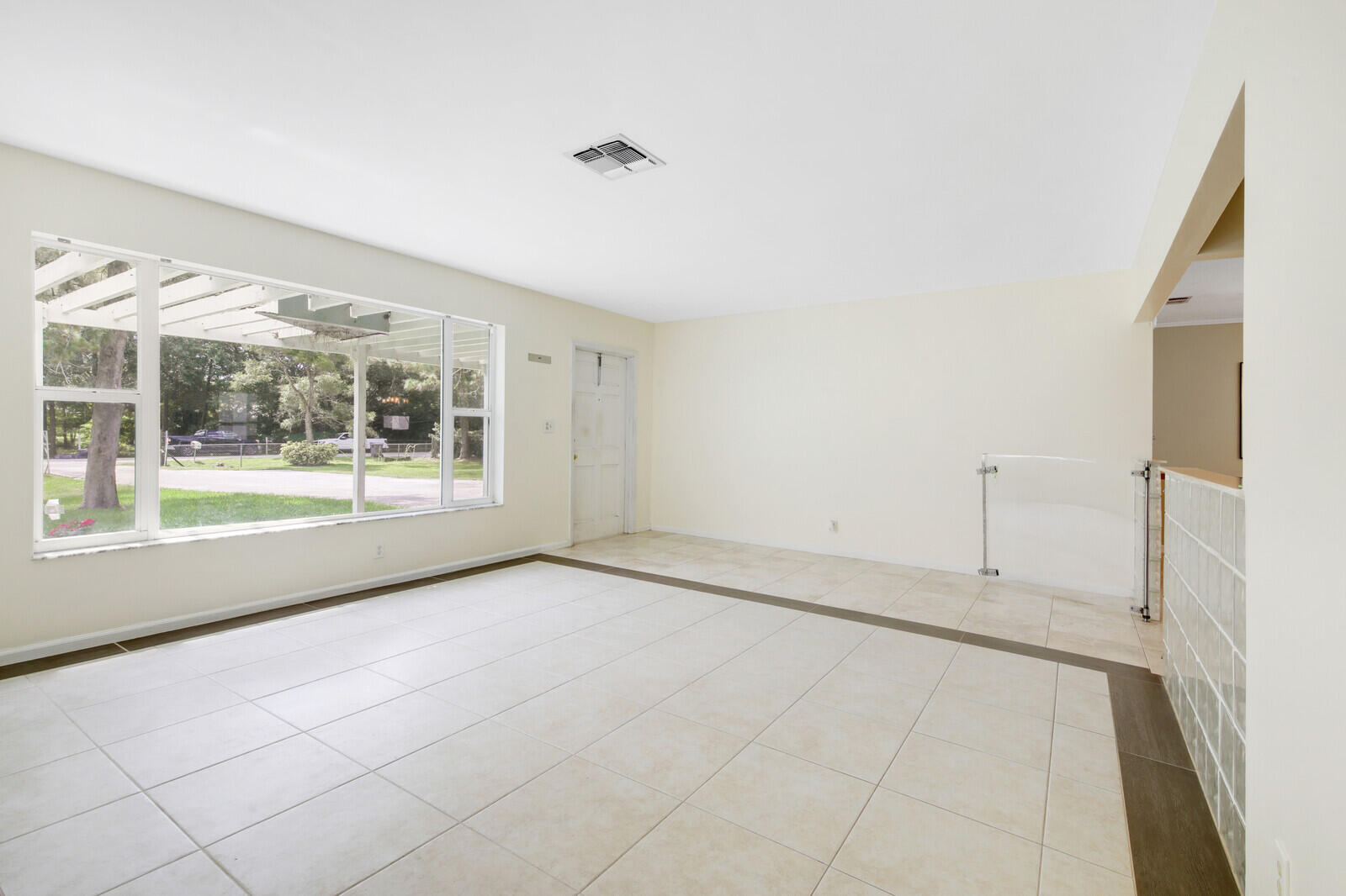 17575 Bridle Court Jupiter, FL 33478 - Photo 8 of 35 a view of an empty room with a window