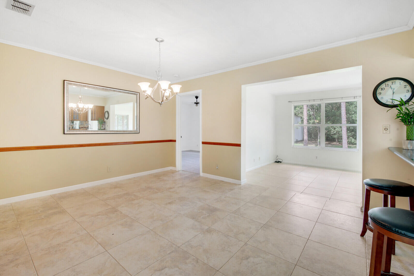 17575 Bridle Court Jupiter, FL 33478 - Photo 9 of 35 an empty room with windows and entrance