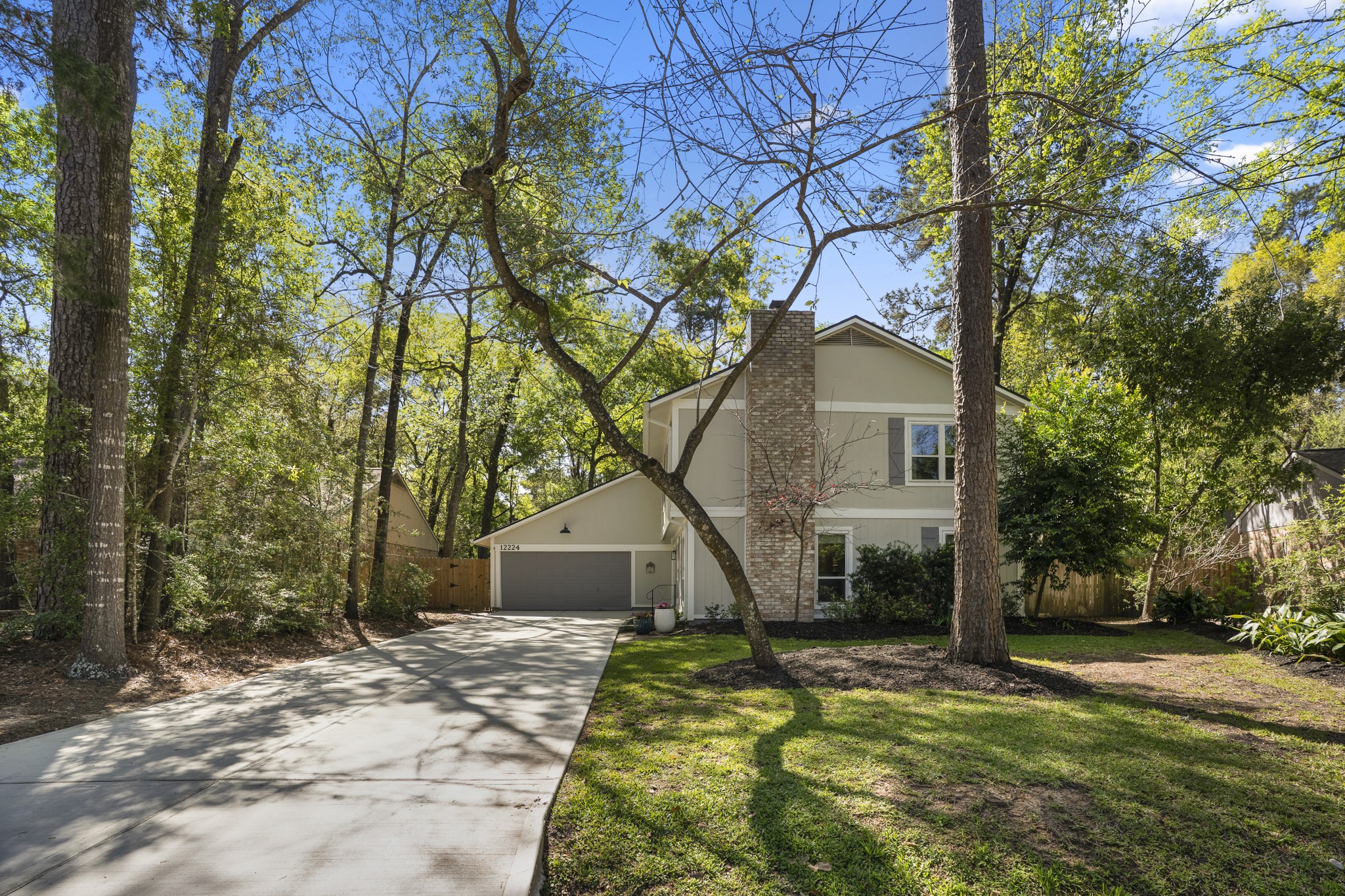 12224 Gun Oak Place Spring, TX 77380 - Photo 29 of 37 Beautifully Treed Front Yard Offering Shade, Privacy, and Exceptional Curb Appeal