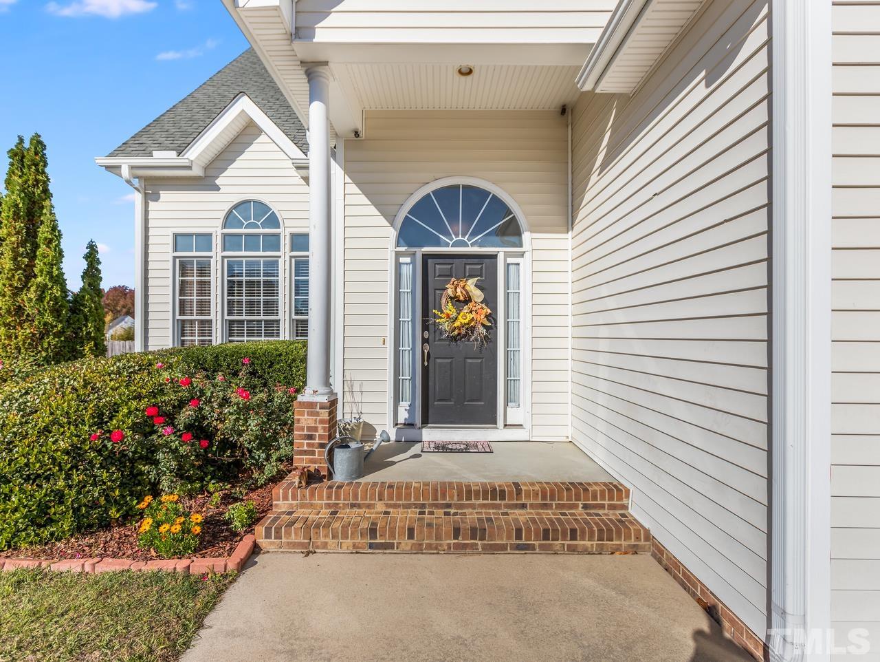 a front view of a house with a porch
