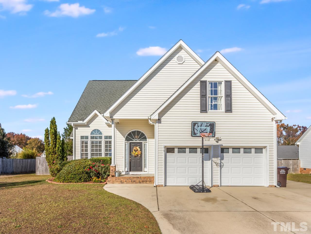 79 Kerrylane Drive Angier, NC 27501 - Photo 2 of 30 a view of a white house with a yard