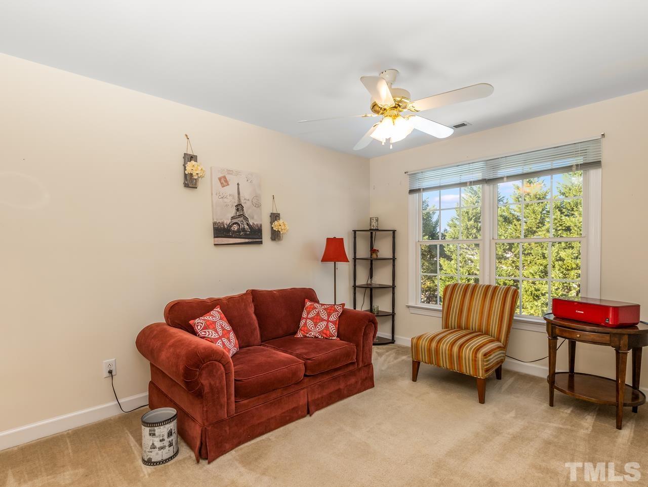 79 Kerrylane Drive Angier, NC 27501 - Photo 22 of 30 a living room with furniture and a large window
