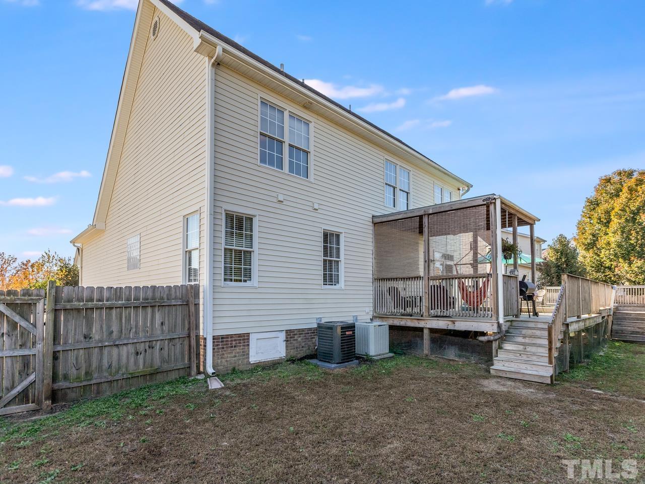79 Kerrylane Drive Angier, NC 27501 - Photo 6 of 30 a view of a house with a backyard