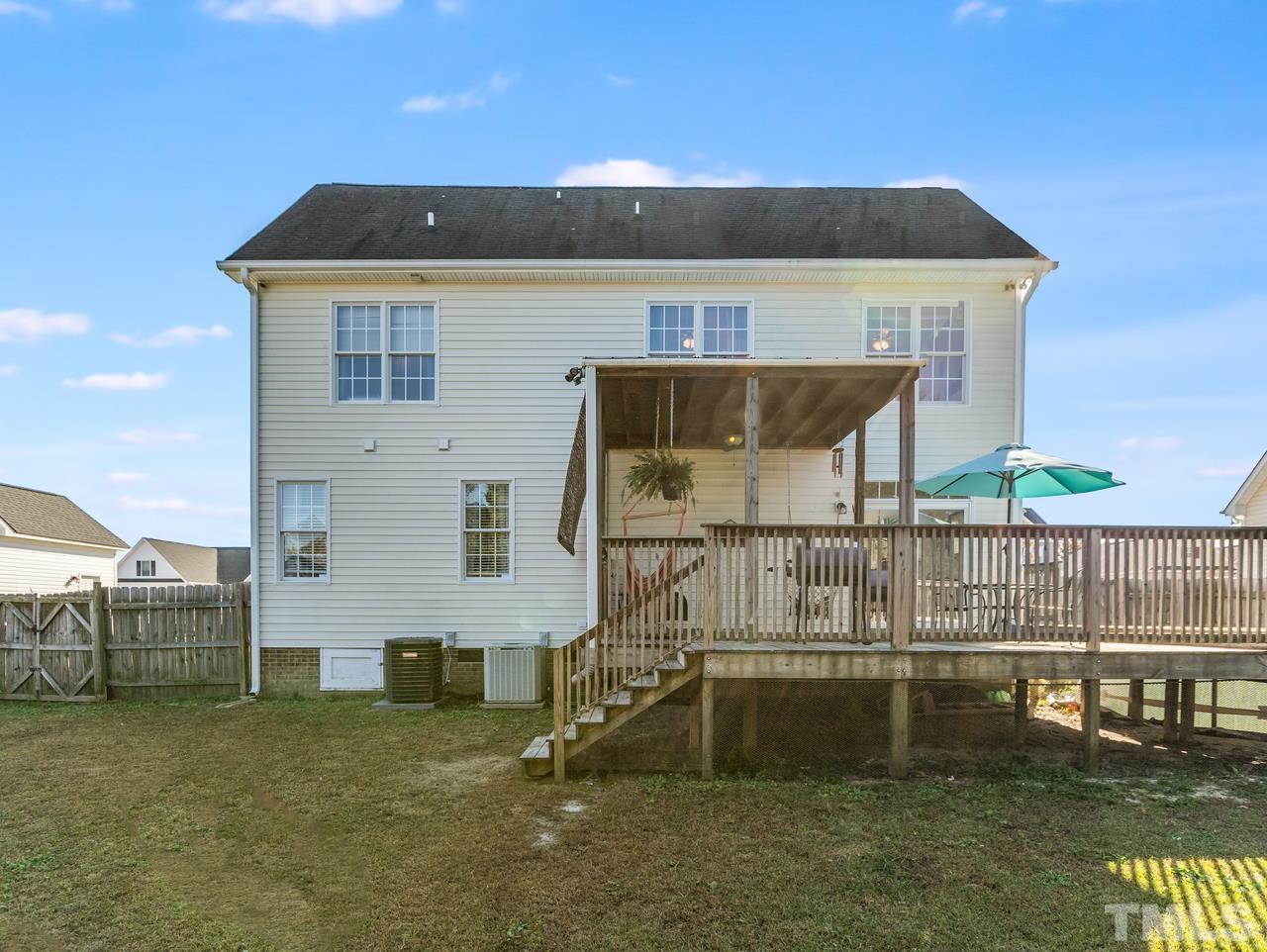 79 Kerrylane Drive Angier, NC 27501 - Photo 7 of 30 a front view of a house with a yard