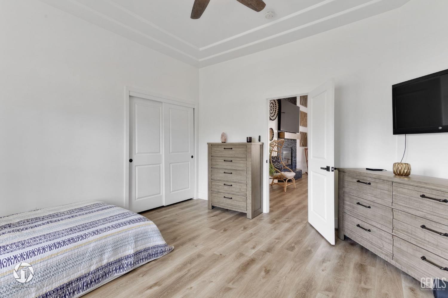 Undisclosed Address Bakersfield, CA 93314 - Photo 25 of 45 a bed room with a bed and a television