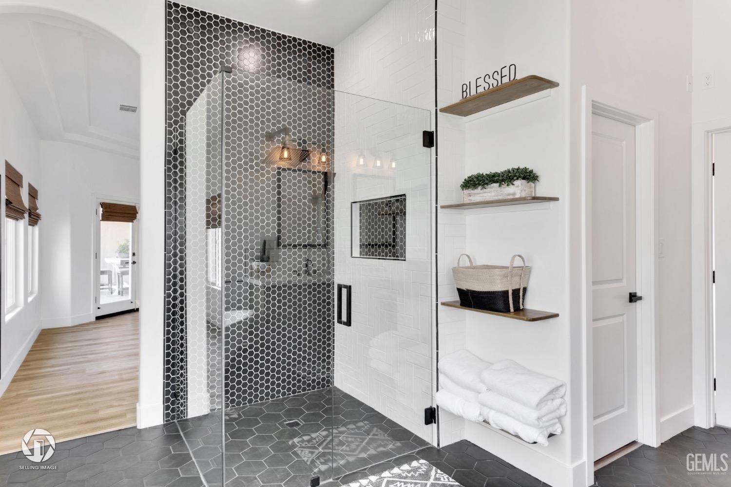Undisclosed Address Bakersfield, CA 93314 - Photo 33 of 45 a bathroom with a shower