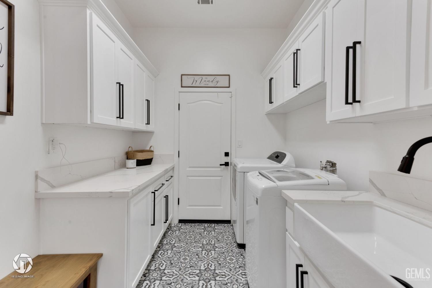 Undisclosed Address Bakersfield, CA 93314 - Photo 41 of 45 a utility room with cabinets