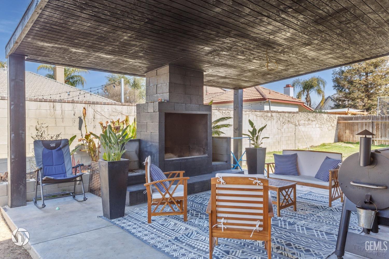 Undisclosed Address Bakersfield, CA 93314 - Photo 45 of 45 a outdoor living space with furniture and a potted plant