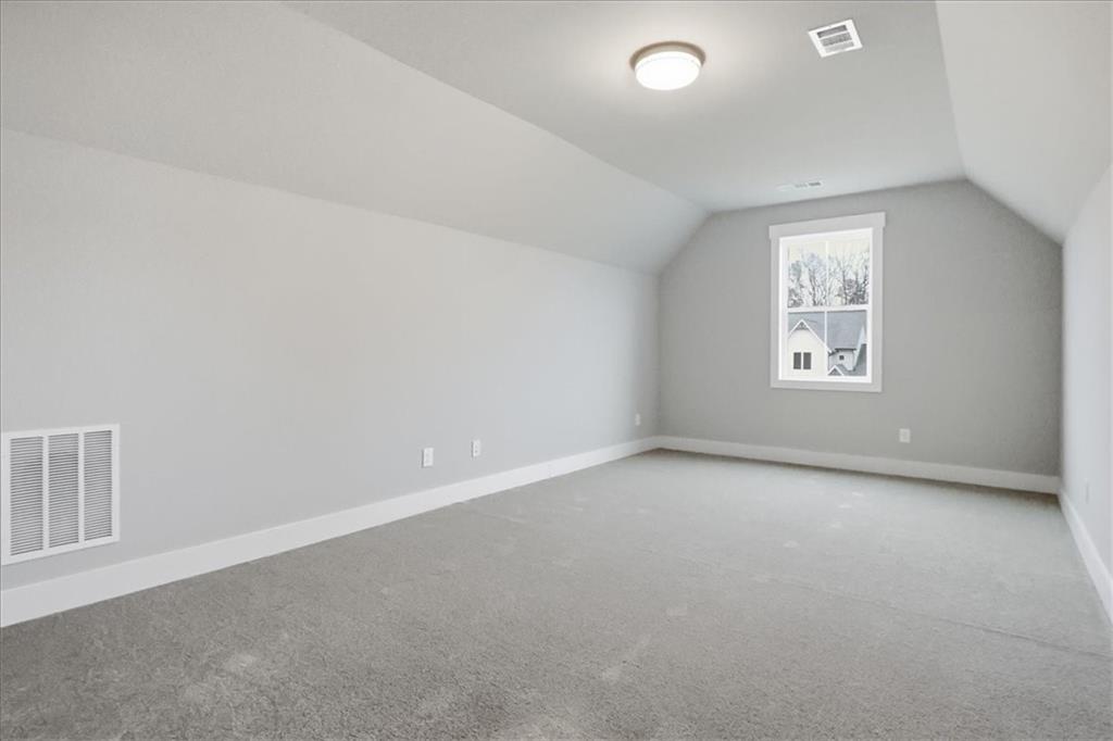 216 Ewing Way Dacula, GA 30019 - Photo 66 of 80 an empty room with windows and closet