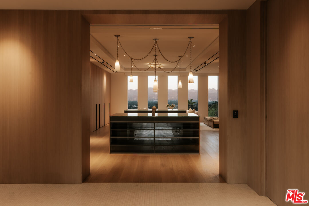 16187 Royal Oak Road Encino, CA 91436 - Photo 15 of 40 a living room with a couch