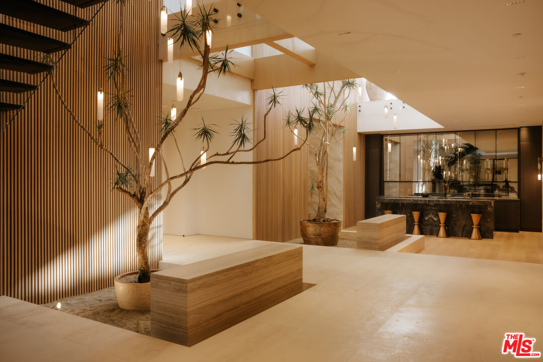 16187 Royal Oak Road Encino, CA 91436 - Photo 21 of 40 a spacious bathroom with a bathtub and shower