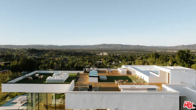 a view of house with outdoor space and sitting area