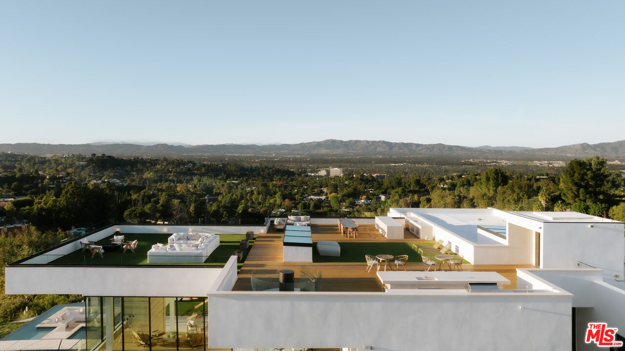 16187 Royal Oak Road Encino, CA 91436 - Photo 37 of 40 an aerial view of a house with a garden