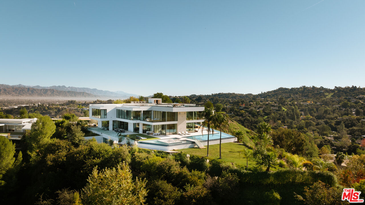 16187 Royal Oak Road Encino, CA 91436 - Photo 40 of 40 a view of a lake with houses