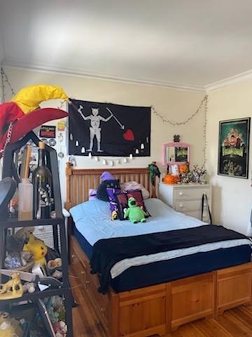 89 Franklin Street, Unit 89 Boston, MA 02134 - Photo 17 of 17 a living room with furniture and a flat screen tv