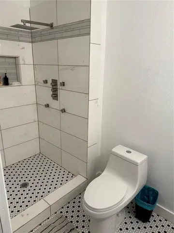 a bathroom with a toilet