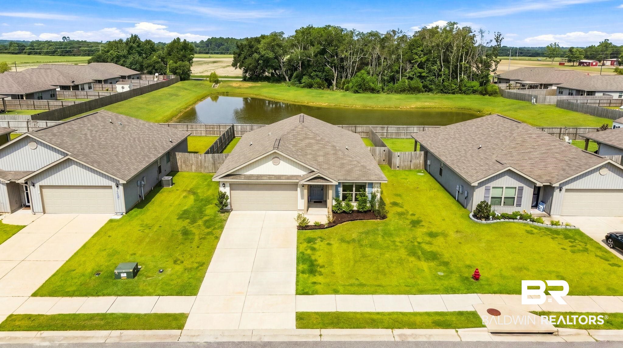 32155 Terranova Loop Lillian, AL 36549 - Photo 12 of 37 Single-story residence featuring a gray exterior siding and a tan roof
