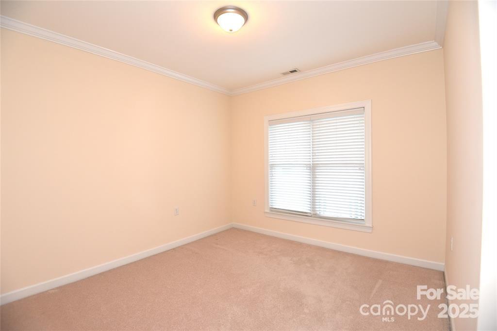 415 Garner Drive Salisbury, NC 28146 - Photo 11 of 19 an empty room with a window