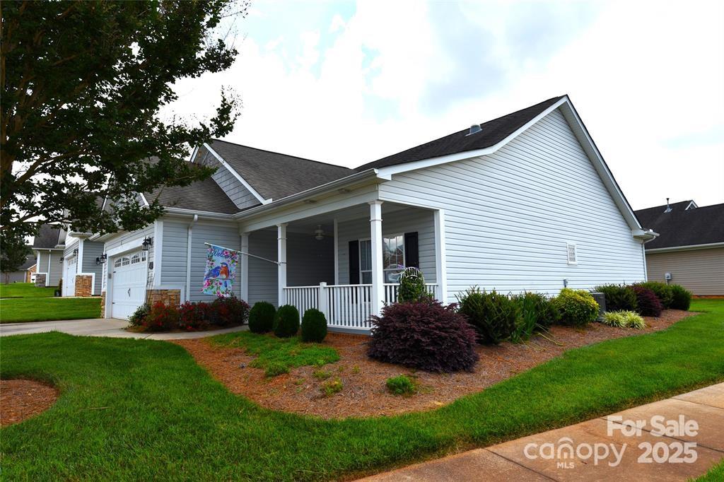 415 Garner Drive Salisbury, NC 28146 - Photo 18 of 19 a front view of house with yard and green space