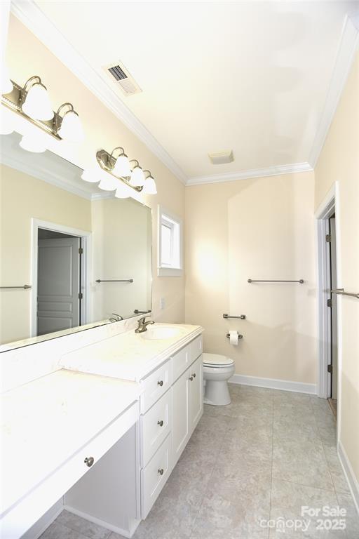 415 Garner Drive Salisbury, NC 28146 - Photo 9 of 19 a spacious bathroom with a double vanity sink mirror and toilet