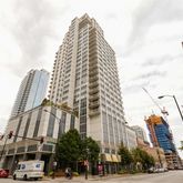 a city street lined with buildings and cars
