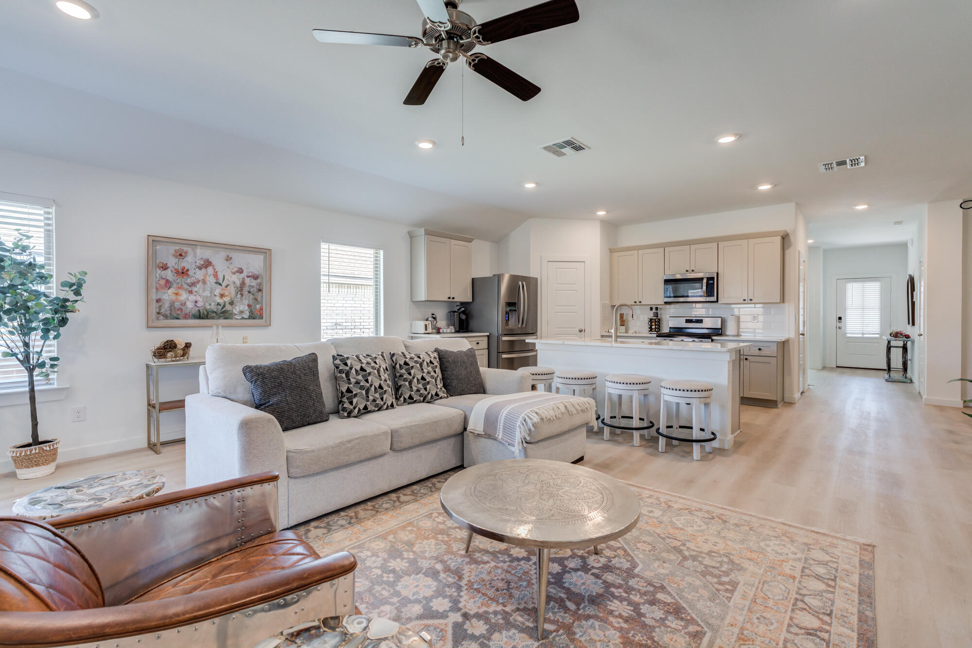 10506 Bangor Avenue Lubbock, TX 79424 - Photo 21 of 37 a living room with furniture and kitchen view
