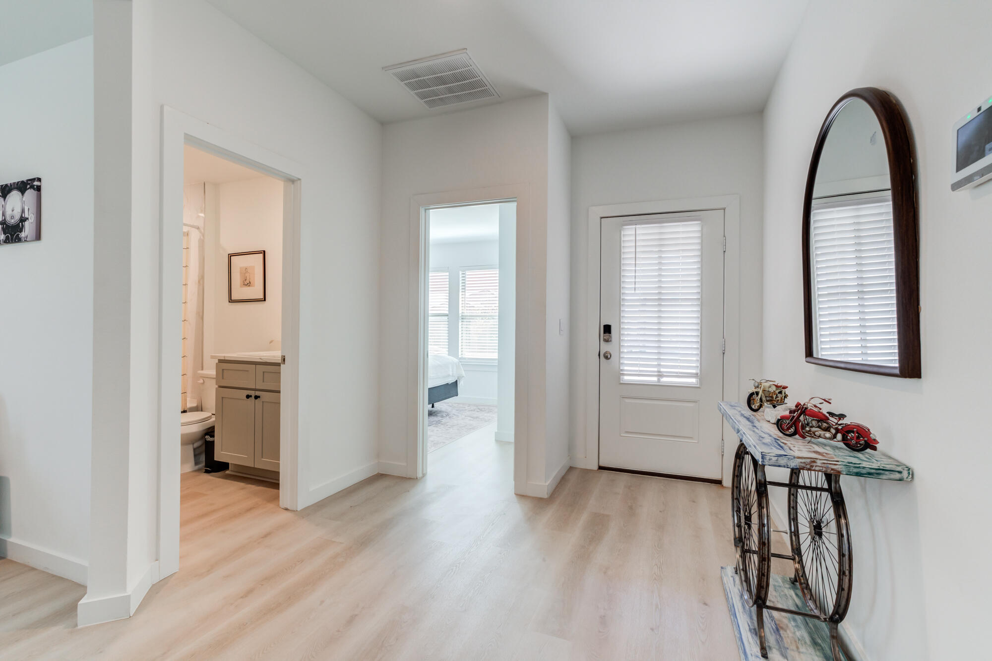 10506 Bangor Avenue Lubbock, TX 79424 - Photo 4 of 37 a view of a room with wooden floor and furniture