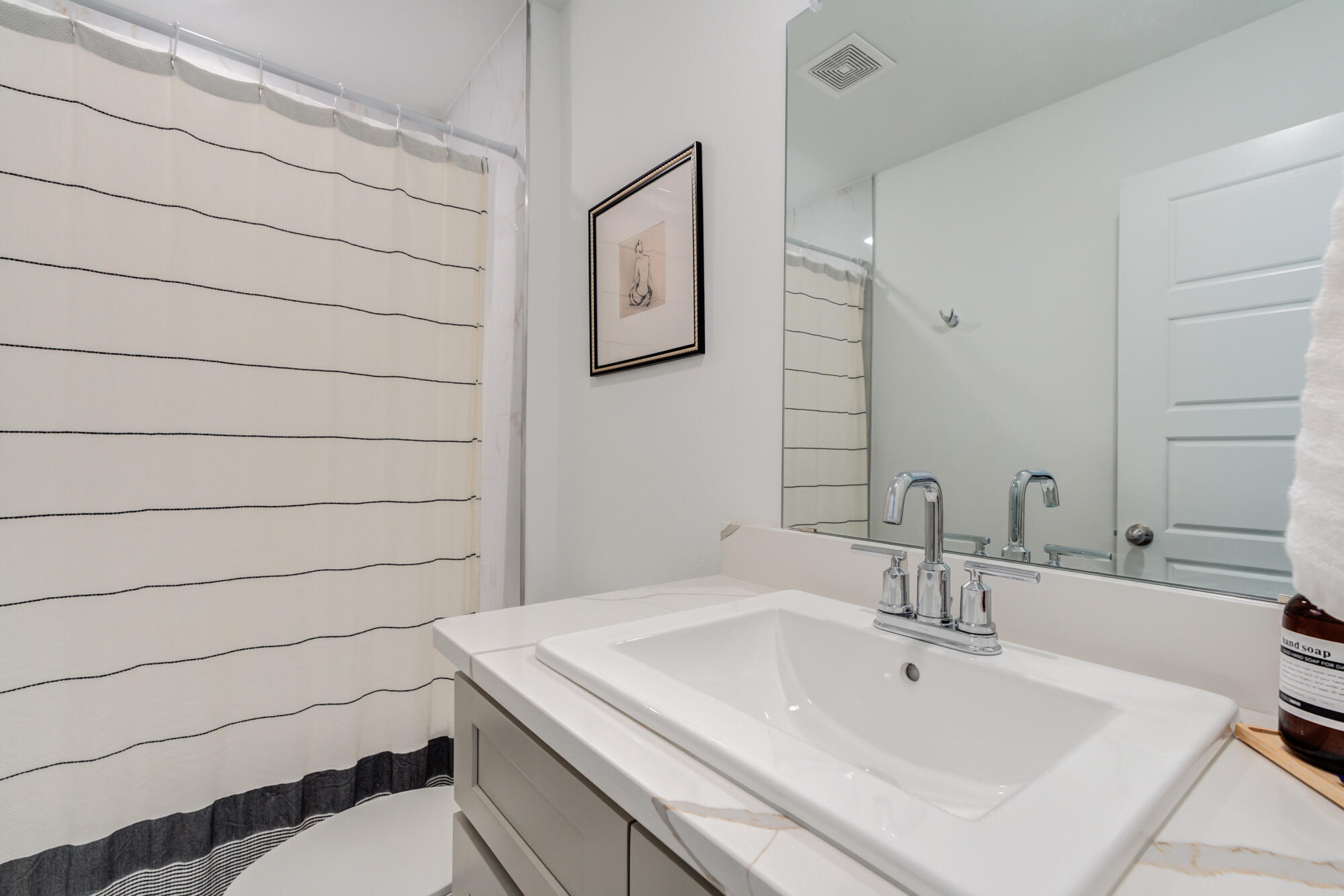 10506 Bangor Avenue Lubbock, TX 79424 - Photo 9 of 37 a bathroom with a sink and a toilet